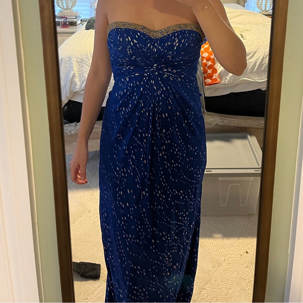 gold and blue beaded gown